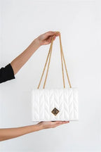 Capone Leeds ženska bijela torba na rame